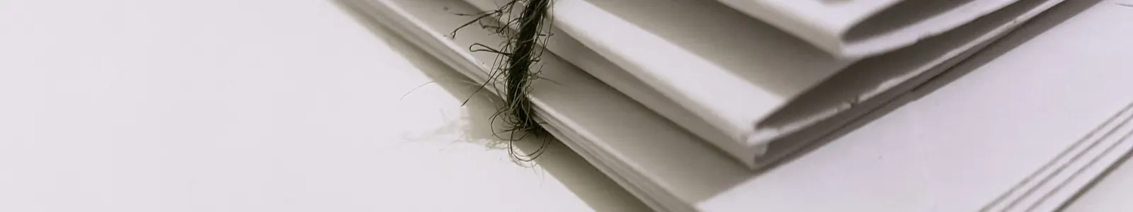 A prepared bundle of court papers tied with string